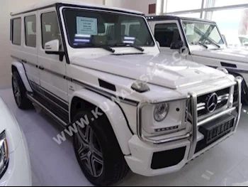مرسيدس - بنز  63 AMG  جي - كلاس  2014  111,000  اس يو في  اتوماتك  8  جلد  دفع رباعي  أبيض  بنزين