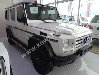 مرسيدس - بنز  500  جي - كلاس  2015  61,000  اس يو في  اتوماتك  8  جلد  دفع رباعي  أبيض  بنزين