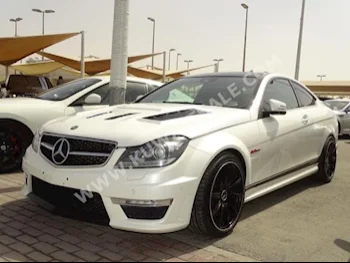 مرسيدس - بنز  63 AMG  سي - كلاس  2013  146,000  سيدان  اتوماتك  8  جلد  دفع خلفي  أبيض  بنزين
