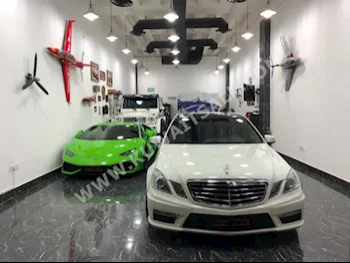 مرسيدس - بنز  63 AMG  اي - كلاس  2010  34,000  سيدان  اتوماتك  4  جلد  دفع خلفي  أبيض  بنزين