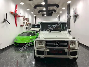 مرسيدس - بنز  55 AMG  جي - كلاس  2011  63,000  اس يو في  اتوماتك  8  جلد  دفع رباعي  أبيض  بنزين