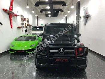مرسيدس - بنز  55 AMG  جي - كلاس  2009  115,000  اس يو في  اتوماتك  8  جلد  دفع رباعي  أسود  بنزين