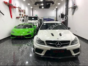 مرسيدس - بنز  63 AMG  سي - كلاس  2012  51,000  سيدان  اتوماتك  6  جلد  دفع خلفي  أبيض  بنزين