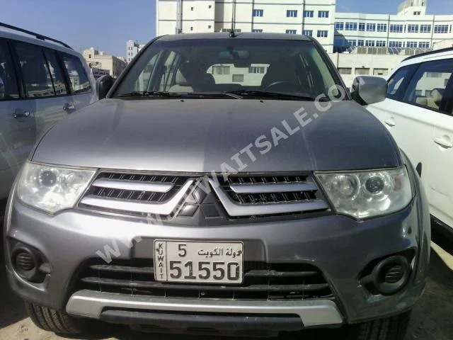 Mitsubishi  Sport  Pajero  2014  71,000  SUV  Automatic  6  Cloth  4WD  Gray  Gasoline