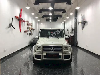 مرسيدس - بنز  63 AMG  جي - كلاس  2013  124,000  اس يو في  اتوماتك  8  جلد  دفع رباعي  أبيض  بنزين