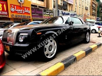 رولز - رويس  دروب هيد  2009  84,000  كوبيه \ سبورت  اتوماتك  12  جلد  دفع خلفي  أسود  بنزين