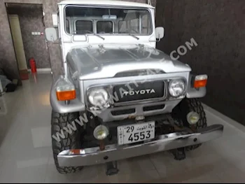 Toyota  LX  Land Cruiser  1981  354,000  SUV  Manual  6  Leather  4WD  Silver  Gasoline