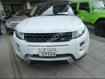 Land Rover  Prestige  Evoque  2015  87,000  SUV  Automatic  4  Leather  RWD  White  Gasoline