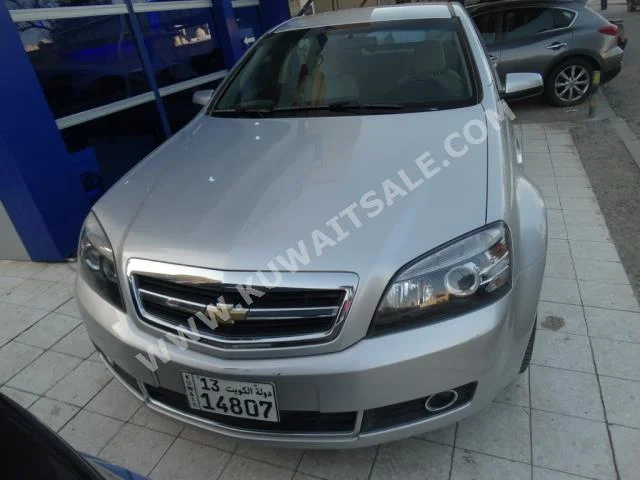 Chevrolet  LTZ  Caprice  2015  50,000  Sedan  Automatic  8  Cloth  RWD  Silver  Gasoline