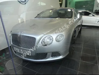 Bentley  Supersport  Continental  2013  53,000  Coupe / Sport  Automatic  12  Leather  4WD  Silver  Gasoline