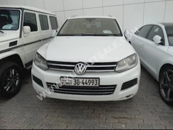 Volkswagen  Touareg  2014  91,000  SUV  Automatic  6  Leather  RWD  White  Gasoline