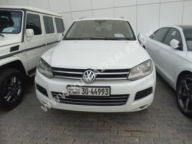 Volkswagen  Touareg  2014  91,000  SUV  Automatic  6  Leather  RWD  White  Gasoline
