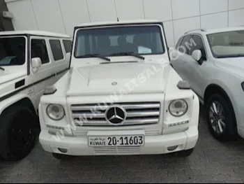 Mercedes-Benz  500  G-Class  2012  99,000  SUV  Automatic  8  Leather  4WD  White  Gasoline