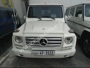 Mercedes-Benz  55 AMG  G-Class  2010  130,000  SUV  Automatic  8  Leather  4WD  White  Gasoline