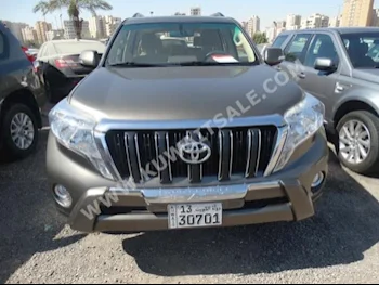 Toyota  TX.L  Prado  2015  140,000  SUV  Automatic  6  Cloth  4WD  Gray  Gasoline