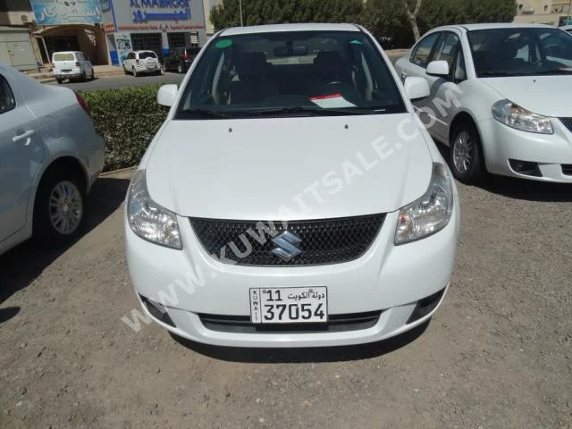 Suzuki  SX4  2014  25,000  Sedan  Automatic  4  Cloth  FWD  White  Gasoline