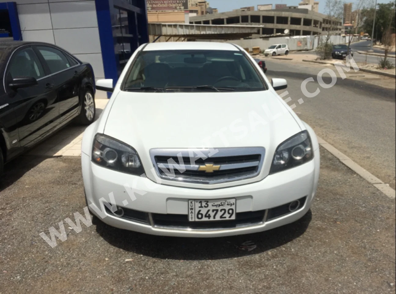 Chevrolet  LTZ  Caprice  2015  50  Sedan  Automatic  8  Cloth  FWD  White  Gasoline