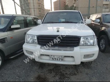 تويوتا  في اكس ار  لاند كروزر  1999  400,000  اس يو في  اتوماتك  8  جلد  دفع رباعي  أبيض  بنزين