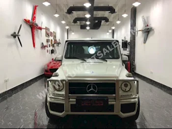 مرسيدس - بنز  55 AMG  جي - كلاس  2010  125,000  اس يو في  اتوماتك  8  جلد  دفع رباعي  أبيض  بنزين