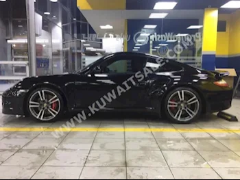 بورش  توربو  911  2011  72,000  كوبيه \ سبورت  اتوماتك  6  جلد  دفع خلفي  أسود  بنزين