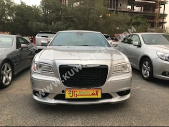 دودج  اس ار تي - 8  تشارجر  2012  103,000  سيدان  اتوماتك  8  جلد  دفع خلفي  فضي  بنزين