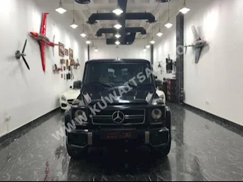 مرسيدس - بنز  63 AMG  جي - كلاس  2013  74,000  اس يو في  اتوماتك  8  جلد  دفع رباعي  أسود  بنزين