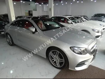 مرسيدس - بنز  200  اي - كلاس  2017  6,500  كوبيه \ سبورت  اتوماتك  4  جلد  دفع خلفي  فضي  بنزين