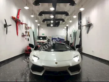 لمبرجيني  LP 700-4  أفانتادور  2014  32,000  كوبيه \ سبورت  اف - 1  12  جلد  دفع خلفي  أبيض  بنزين