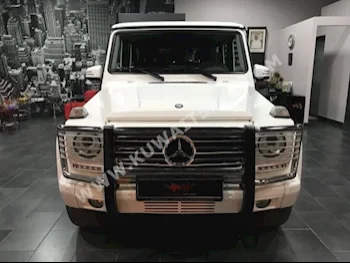 مرسيدس - بنز  500  جي - كلاس  2015  50,000  اس يو في  اتوماتك  8  جلد  دفع رباعي  أبيض  بنزين
