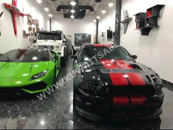 فورد  شيلبي جي تي500  موستانغ  2013  54,000  كوبيه \ سبورت  عادي  8  جلد  دفع خلفي  أسود  بنزين