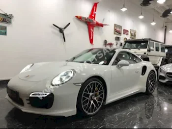 بورش  توربو اس  911  2014  83,000  كوبيه \ سبورت  اتوماتك  8  جلد  دفع خلفي  أبيض  بنزين