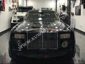رولز - رويس  فانتوم  2004  17,000  كوبيه \ سبورت  اتوماتك  12  جلد  دفع كلي مستمر  أسود  بنزين
