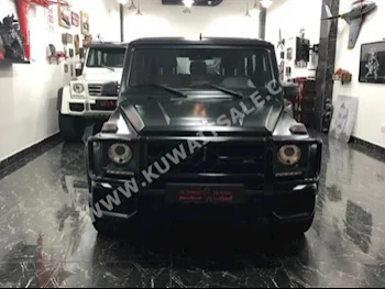 مرسيدس - بنز  63 AMG  جي - كلاس  2015  48,000  اس يو في  اتوماتك  8  جلد  دفع رباعي  أسود مطفي  بنزين