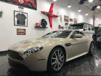 أستون مارتن  اس  فانتج  2013  44,000  كوبيه \ سبورت  اتوماتك  8  جلد  دفع خلفي  ذهبي  بنزين