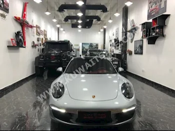بورش  كاريرا اس  911  2014  80,000  كوبيه \ سبورت  اتوماتك  6  جلد  دفع خلفي  فضي  بنزين
