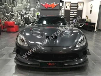 دودج  فايبر  2016  5,000  كوبيه \ سبورت  اتوماتك  10  مخمل  دفع خلفي  رمادي  بنزين