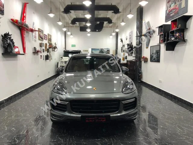 Porsche  GTS  Cayenne  2016  95,000  SUV  Automatic  8  Leather  4WD  Gray  Gasoline