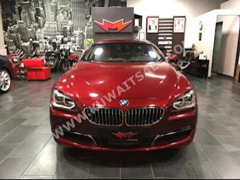 بي ام دبليو  640i  الفئة - السادسة  2015  17,000  كوبيه \ سبورت  اتوماتك  8  جلد  دفع خلفي  أحمر غامق  بنزين