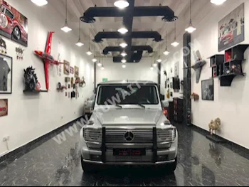 مرسيدس - بنز  55 AMG  جي - كلاس  2005  180,000  اس يو في  اتوماتك  8  جلد  دفع رباعي  رمادي  بنزين