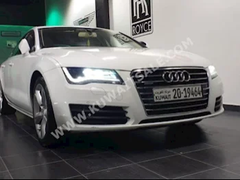 اودي  أي 7  2013  116,000  سيدان  اتوماتك  6  جلد  دفع خلفي  أبيض  بنزين