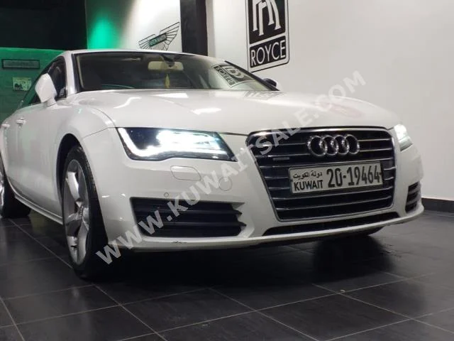 اودي  أي 7  2013  116,000  سيدان  اتوماتك  6  جلد  دفع خلفي  أبيض  بنزين