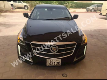 كاديلاك  اس تي اس  2014  90,000  سيدان  اف - 1  6  جلد  دفع خلفي  أسود  بنزين