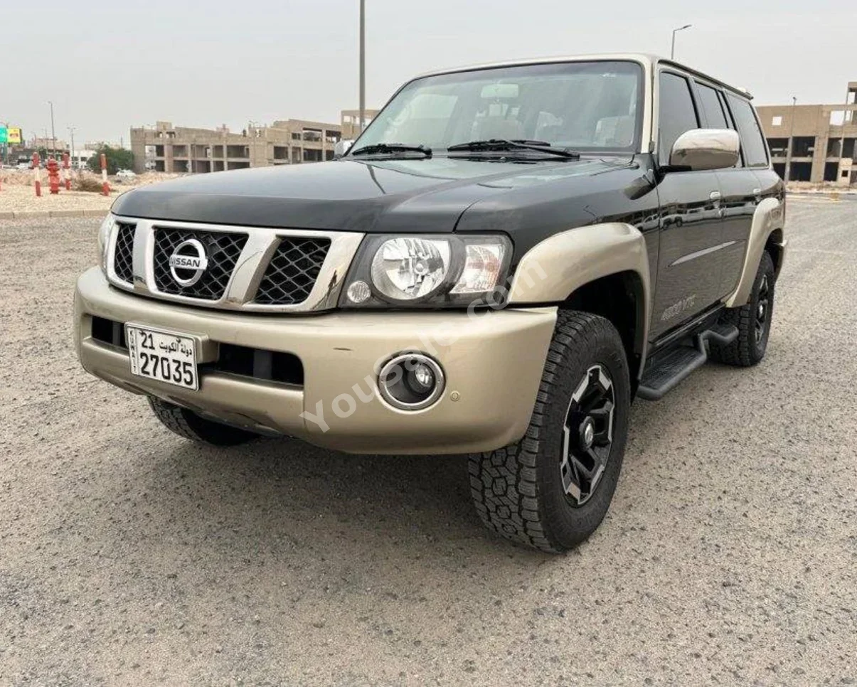 Nissan  Patrol  Super Safari  2022  Automatic  54,000 Km  6 Cylinder  4WD  SUV  Black  With Warranty