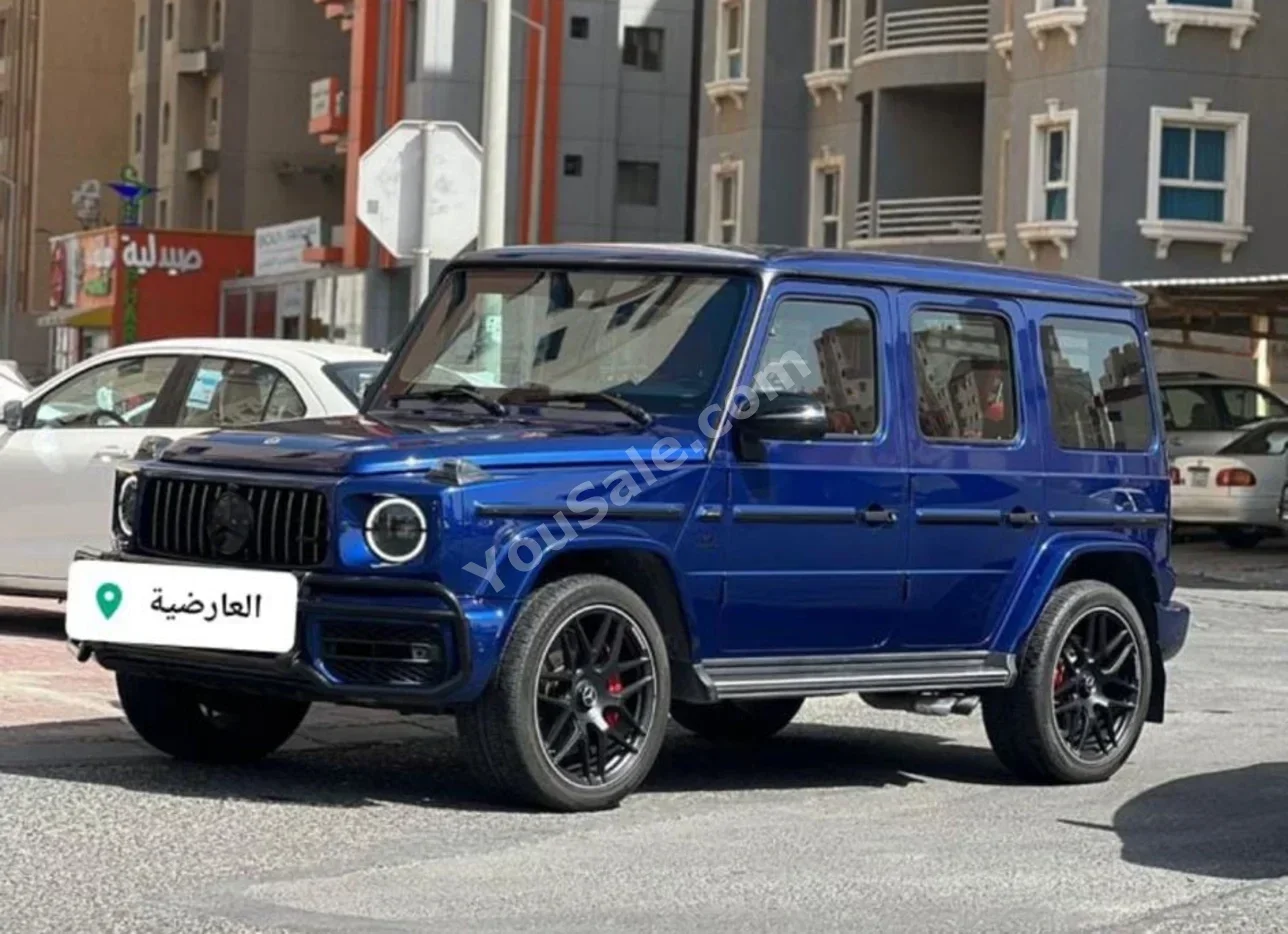 Mercedes-Benz  G55 AMG  8 Cylinder  SUV 4x4  Blue  2023