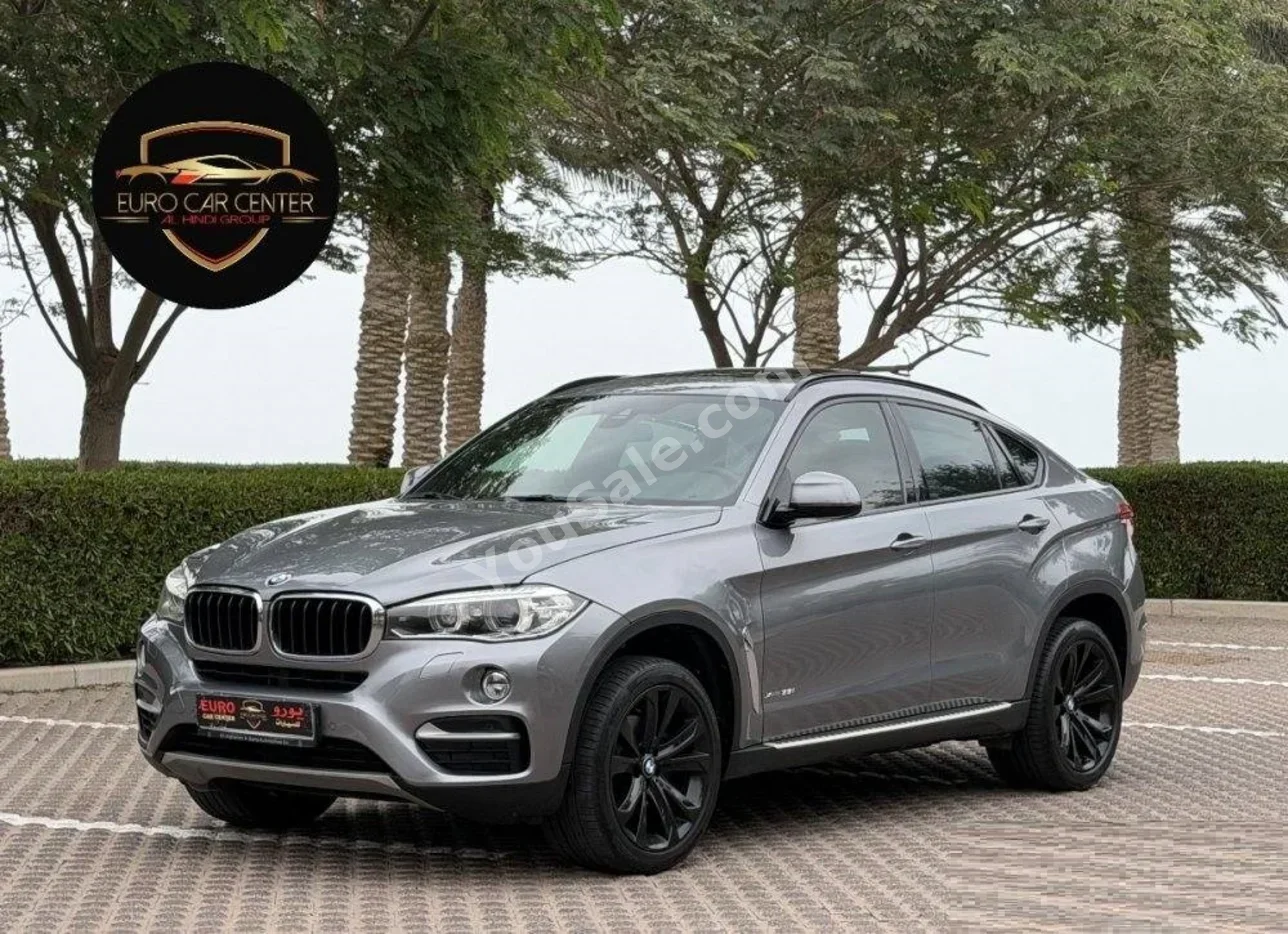 بي ام دبليو الفئة - اكس 6 2015 اتوماتيك 146,000 كم 6 سلندر دفع رباعي اس يو في رمادي