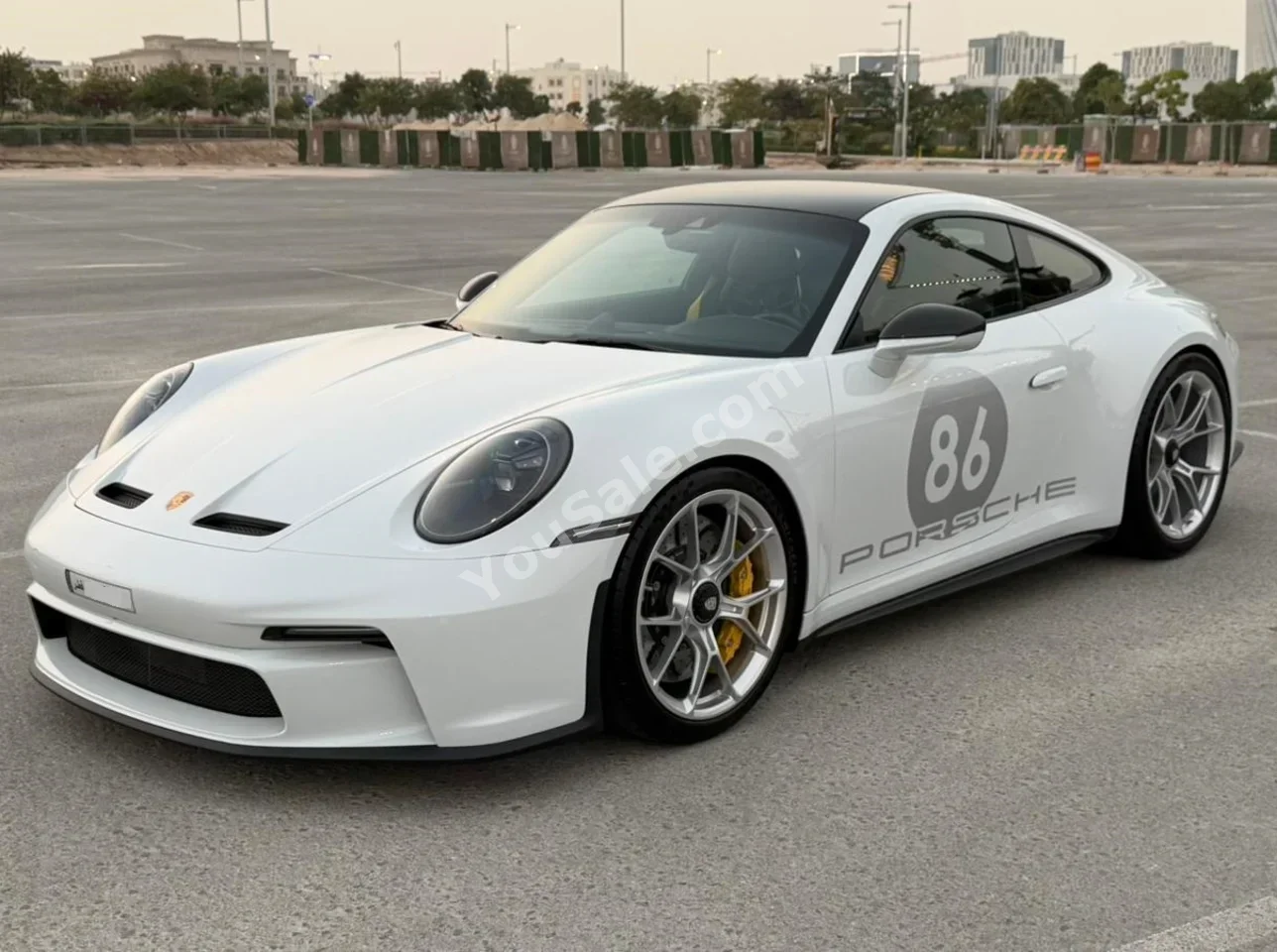 بورش 911 جي تي 3 2023 عادي 11,000 كم 6 سلندر دفع خلفي كوبيه \ سبورت أبيض تحت الضمان