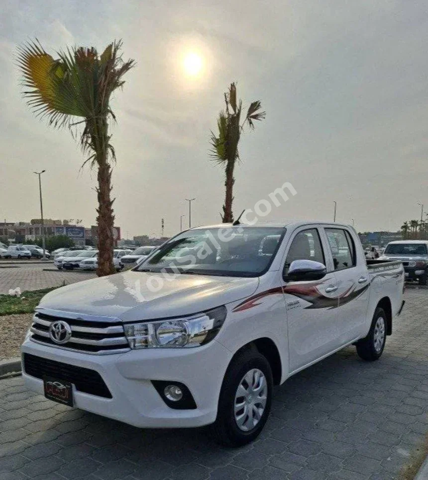 Toyota  Hilux  SRS  2023  Automatic  24,000 Km  4 Cylinder  RWD  Pick Up  White
