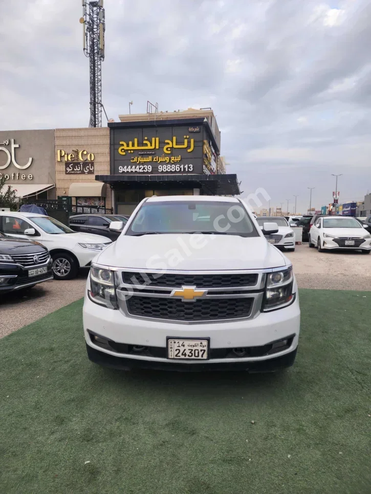 شفروليه تاهو ال اس 2016 اتوماتيك 350,000 كم 8 سلندر دفع رباعي اس يو في أبيض لؤلؤي