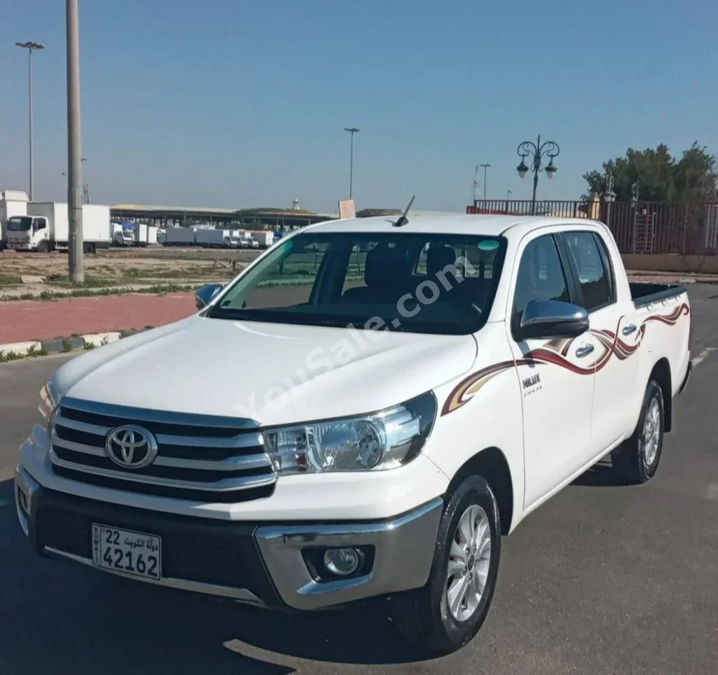Toyota  Hilux  SRS  2023  Automatic  17,250 Km  4 Cylinder  4WD  Pick Up  White  With Warranty