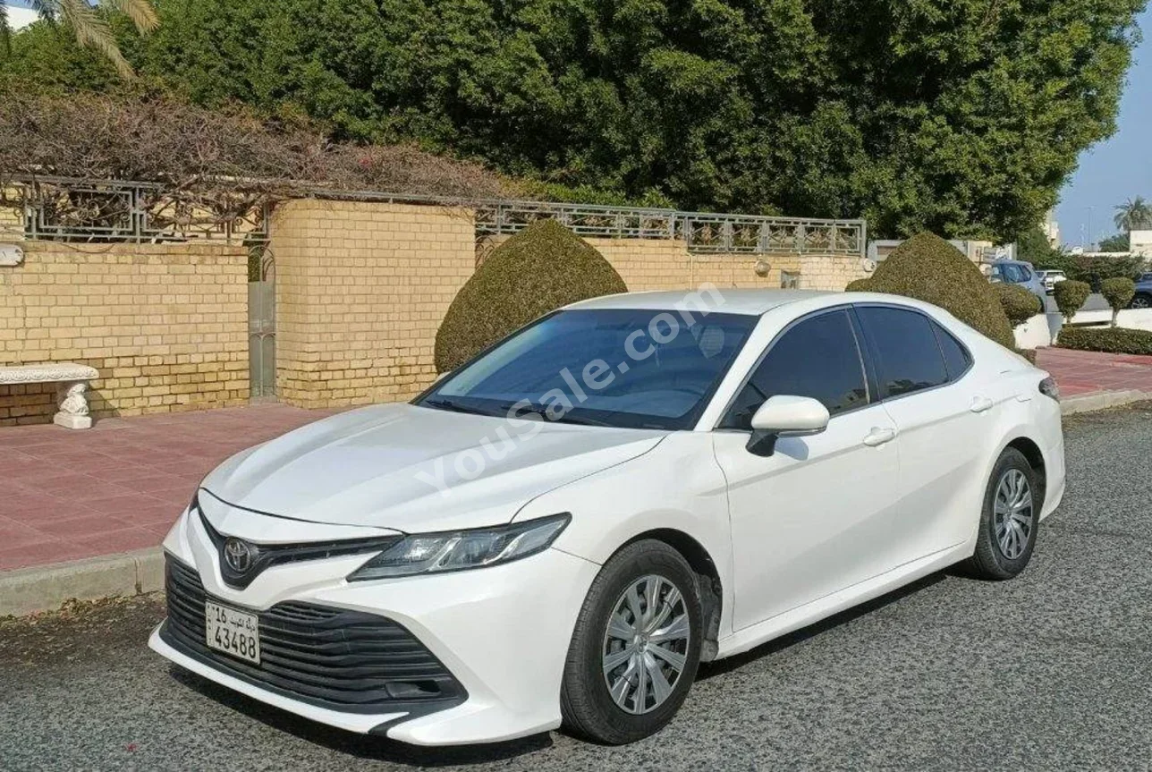 Toyota  Camry  LE  2019  Automatic  186,000 Km  4 Cylinder  FWD  Sedan  White